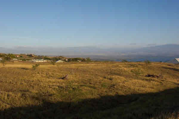 followed by Mauna Loa in the middle and the edge of Hualalai to the right...